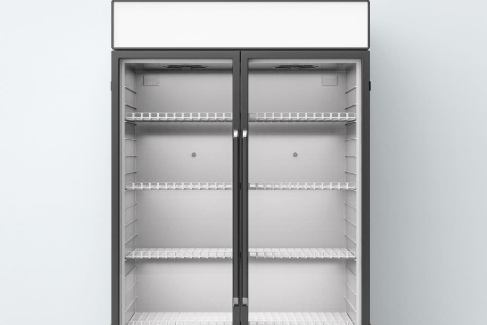 Empty double-door commercial reach-in refrigerator with glass doors and white wire shelving